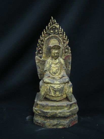 null Bodhisattva assis en méditation sur un haut trône, auréolé et entouré d'une...