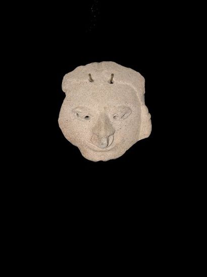 EQUATEUR Culture Tumaco-La Tolita (300 av. - 500 ap. J.C.) Fragment de tête humaine....