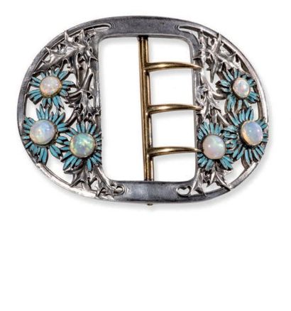 RENE LALIQUE (1860-1945) 
Rare boucle de ceinture à motifs floraux, en argent, or,...