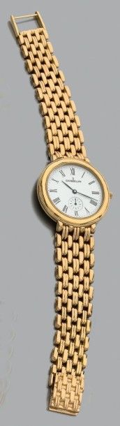 GUBELIN, vers 1993 Montre bracelet en or jaune 18K (750°/00), boîtier rond, cadran...