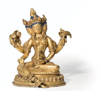 TIBET - XXe siècle 
Statuette de Tara jaune, Janguli, à trois têtes et six bras en...