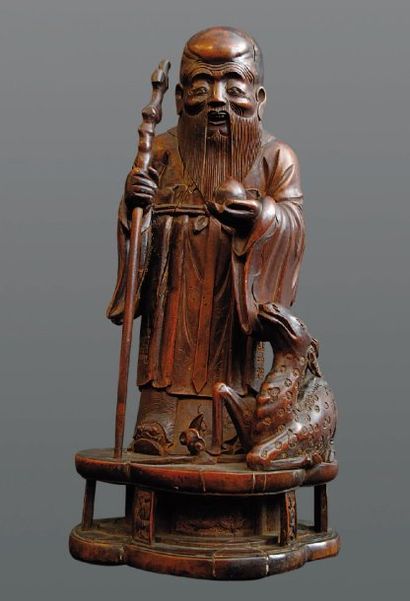 null T'SING ( XIXe siècle ) Statue représentant Lao Tseu. En bois sculpté. H : 19...