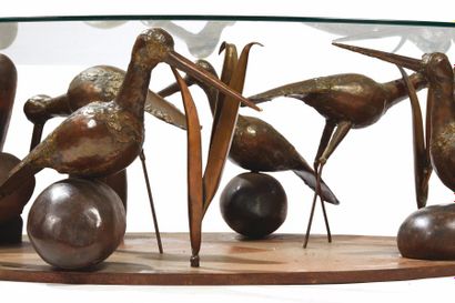 René BROISSAND (né en 1926) 
Exceptionnelle table basse à plateau ovale en verre...