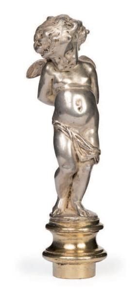 null Sceau à cacheter en bronze argenté et doré figurant un putto.
XIXe siècle
H....