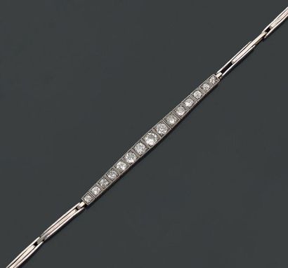 null Bracelet ligne en or 18K (750°/00) deux tons, platine (950°/00), serti de 15...