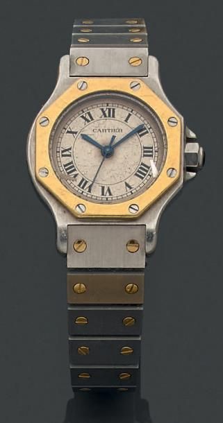 CARTIER "Santos". Montre bracelet de dame en or 18K (750°/00) et acier; cadran dateur;...