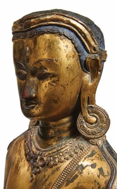 TIBET - XVIIe siècle 
Grande statue d'Avalokitesvara en bronze doré, se tenant debout,...