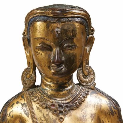 TIBET - XVIIe siècle 
Grande statue d'Avalokitesvara en bronze doré, se tenant debout,...