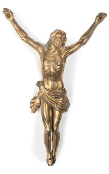 Grand Christ en bronze doré. Tête levée vers...