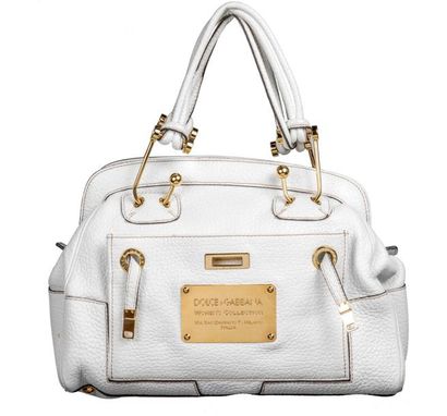 DOLCE ET GABBANA Grand sac porté main en cuir blanc. Petite bijouterie en métal de...