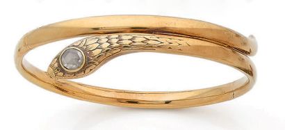 null Bracelet jonc ouvrant serpent en or jaune 14K (585°/00), la tête du serpent...