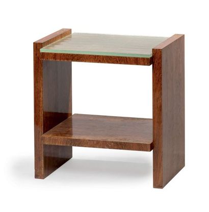 JACQUES ADNET (1901-1984) # Table basse en placage de palissandre présentant deux...