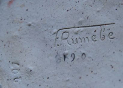 Fernand RUMEBE (1875-1952) Vase piriforme en grès émaillé brun nuancé blanc et bleu-ocre....