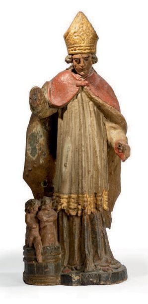 null Saint Nicolas en bois sculpté polychromé et doré.
XVIIe siècle.
H: 50 cm (accidents,...
