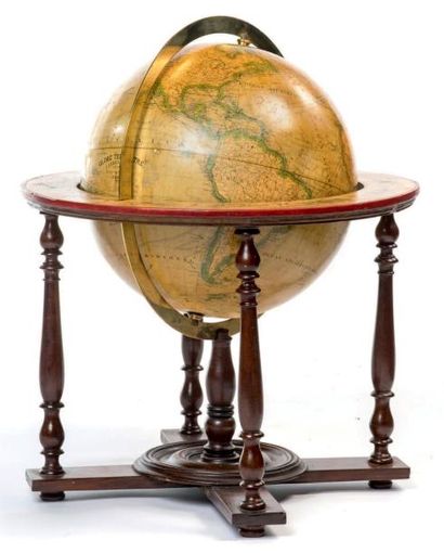  Globe terrestre Cercle méridien en laiton, pied sur quatre colonnettes en bois....