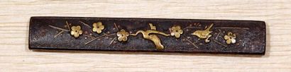 JAPON - Epoque EDO (1603 - 1868) 
Two iron kozuka, one decorated with plum blossoms...