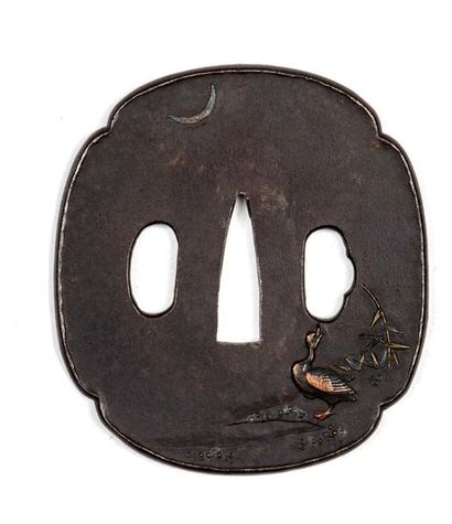 Époque EDO (1603 - 1868) Ensemble de sept tsuba en fer à décor incrusté de cuivre...