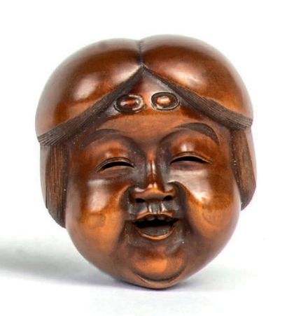 Époque EDO (1603 - 1868) Netsuke en bois, masque de Okame en bois, souriante, les...