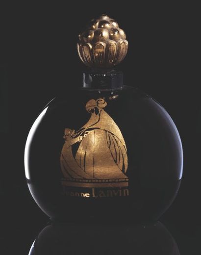 Jeanne LANVIN «Comme ci - comme ça»
Flacon en forme de boule noire en verre opaque...