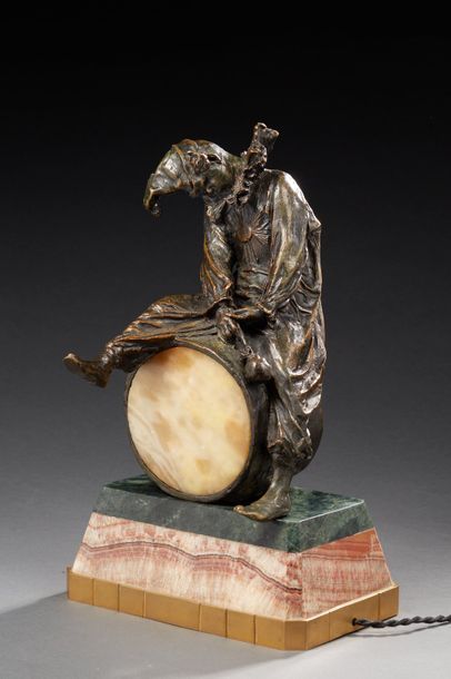 BONANNI (XIX-XXème) 
Rare sculpture éclairante en bronze à patine brune et médaille...