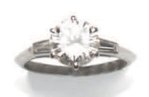 MAUBOUSSIN Bague solitaire en platine (950°/00) sertie griffes d'un diamant rond...