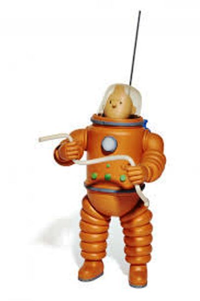 null PIXI. 45911. Tintin en cosmonaute.
Moulinsart. Figurine en résine polychrome...