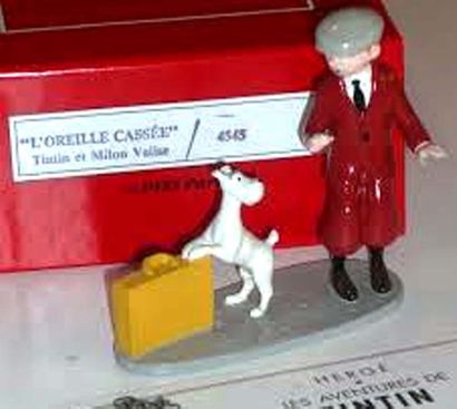 null PIXI 4545. Tintin et Milou + valise.
D'après «L'Oreille cassée». Avec boite...
