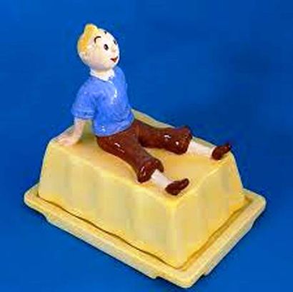 null «Tintin Beurrier».
Tintin est assis sur le beurrier. Rare céramique polychrome....