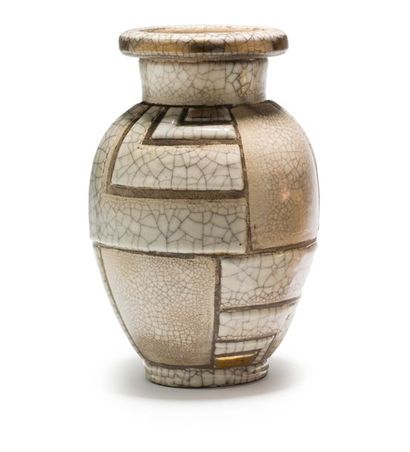 René BUTHAUD (1886-1986) Vase ovoïde en grès émaillé craquelé beige, ocre et blanc
Signé...