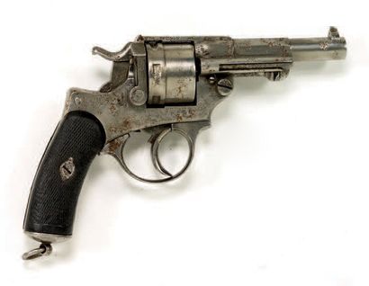 null Revolver d'ordonnance modèle 1873 S 1884
Six coups, calibre 11mm/73.
Canon rayé....