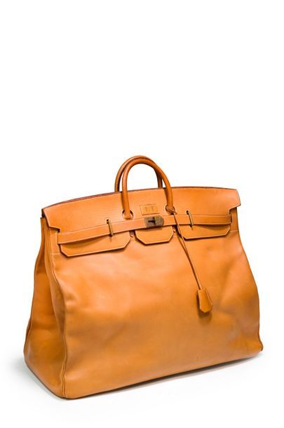 HERMES, Paris Birkin, modèle haut à courroie de week-end en cuir naturel. Monogrammé
L:...