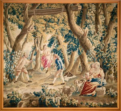 null Tapisserie en laine polychrome à décor d'une scène d'escarpolette.
XVIIIe siècle.
H....