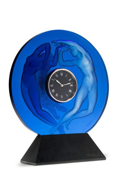 RENE LALIQUE (1860-1945) «Le jour et la nuit»
Très rare pendule circulaire en verre...