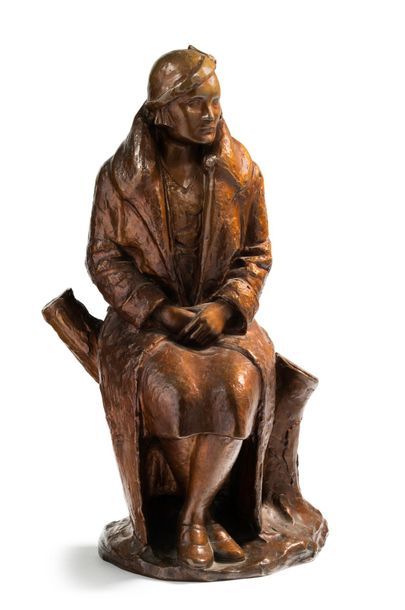 TRAVAIL 1930 Sculpture en bronze patine médaille représentant une femme assise
Monogrammée...