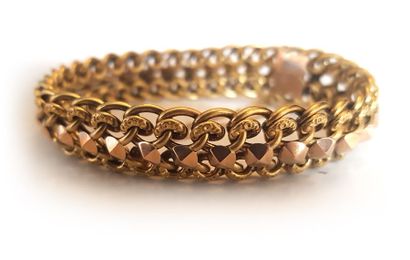 null Bracelet articulé en or jaune 750 millièmes, les maillons ajourés à décor de...