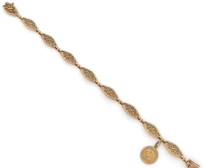 null Bracelet articulé en or jaune 750 millièmes, les maillons ajourés et à décor...