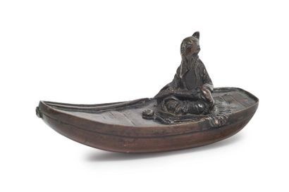 CHINE - XVIIIe/XIXe siècle Compte-gouttes en bronze à patine brune figurant un lettré...