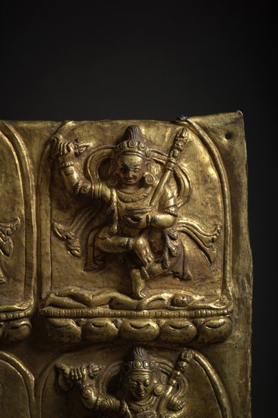 TIBET - XVIe/XVIIe siècle ● TIBET - 16th/17th century
A gilt copper repoussé plaque...