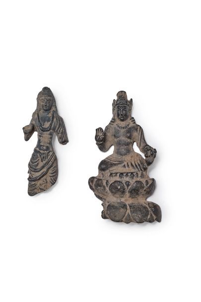 null Two bronze fragments:
- Boddhisattva sitting in padmasana on a lotus-shaped...