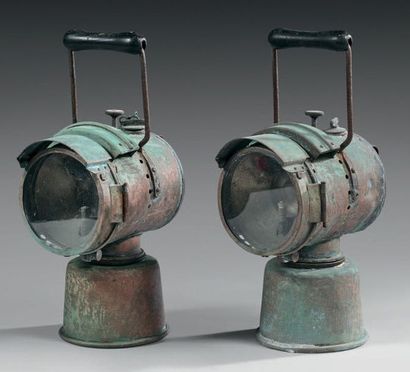 null PAIR OF ACETYLENE
LAMPS Iron, cylindrical in shape, circular glass, iron and...