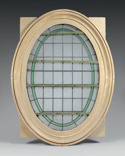 null PARISIAN
BUILDING GLASS WINDOW Oval-shaped, with translucent white checks surrounded...