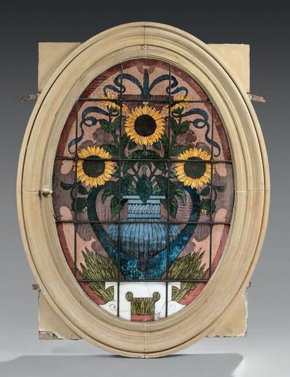 null PARISIAN
BUILDING WINDOW Oval shaped, featuring sunflowers, molded wood frame,...