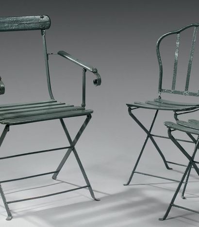null PARISIAN
GARDEN FURNITURE Comprising:
TWO CHAIRS Iron painted green, the animated...