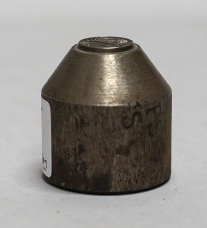 null STAMPING PUNCH

Iron, cylindrical in shape, showing a representation of the...