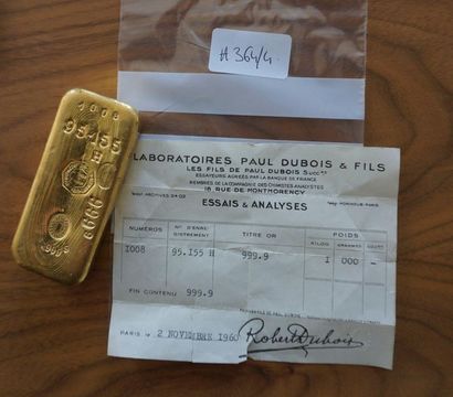 null *A 999-thousandths gold ingot, number 95155 and its test bulletin. Weight: 1,000.1...