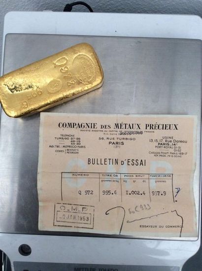 null Gold ingot 995.6 thousandths, number Q972, with its certificate, weight: 1002.4...