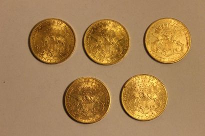null A combination of five 20 US dollar gold coins, three 1904 and two 1903. Total...