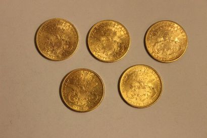 null A collection of five 20-dollar gold coins, two of which date from 1899, one...