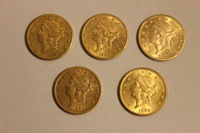 null A combination of five 20 US dollar gold coins, one from 1897, one from 1898...
