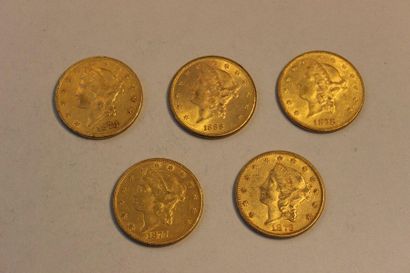 null A collection of five 20-dollar gold coins, one from 1873, one from 1877, two...